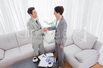 Business people shaking hands after meeting