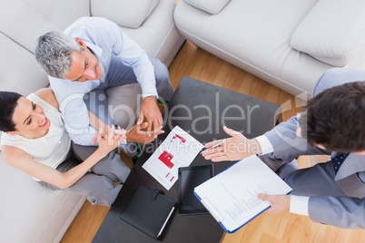 Salesman making his pitch to couple