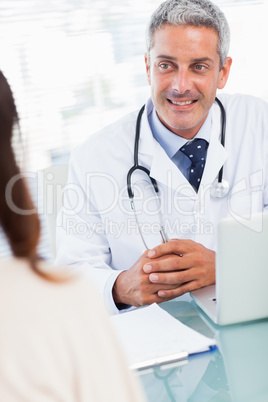 Doctor talking with his patient