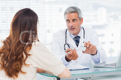 Doctor talking with his patient seriously