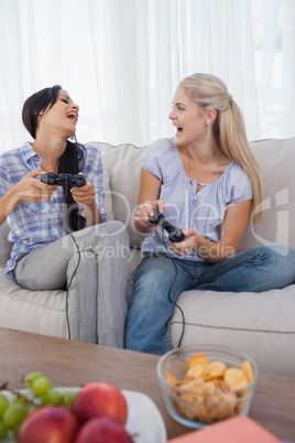 Happy friends playing video games
