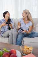 Happy friends playing video games