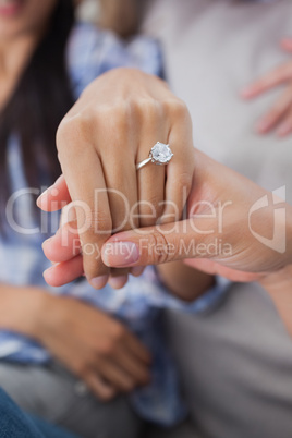 Close up of engagement ring on womans hand