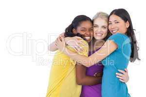 Diverse young women embracing each other