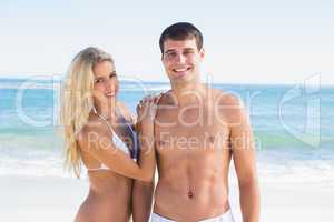 Attractive young couple smiling at camera