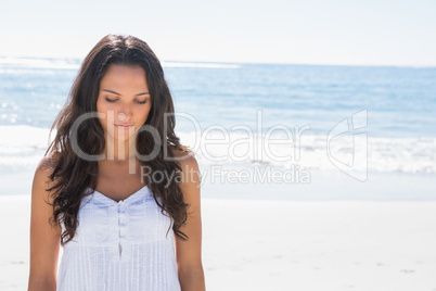 Beautiful brunette in white sun dress