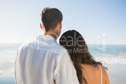 Peaceful couple looking at the ocean