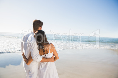 Content couple looking at the sea