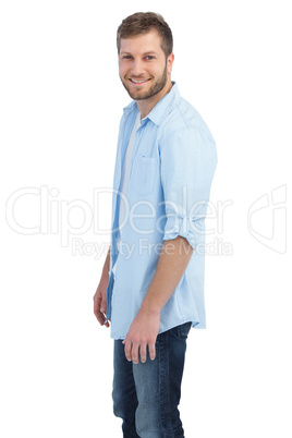 Casual young man looking at camera