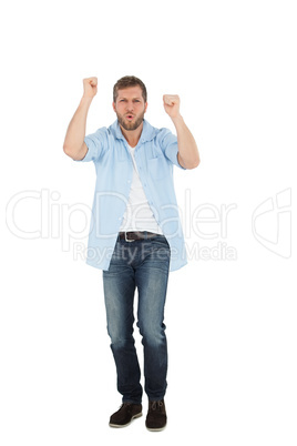 Cheerful casual man cheering