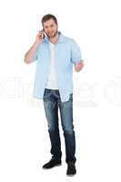 Relaxed man posing while having a call