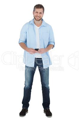 Happy man holding a phone Happy man holding a phone