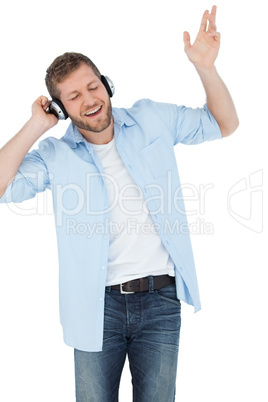 Cool trendy model listening to music and singing