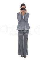 Young woman posing with binoculars