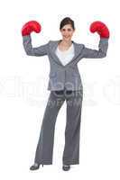 Businesswoman with red boxing gloves