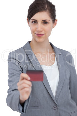 Businesswoman holding credit card