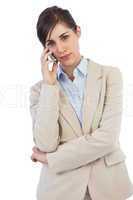 Serious businesswoman on the phone