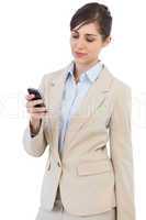 Pensive businesswoman posing with phone