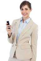 Cheerful businesswoman posing with phone