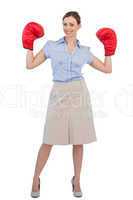 Buisnesswoman posing with boxing gloves