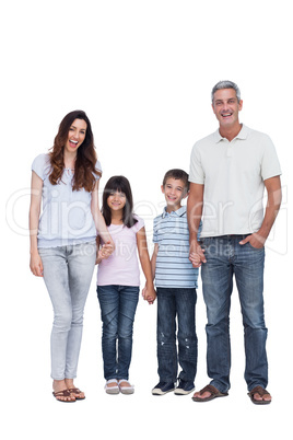 Cheerful family holding hands