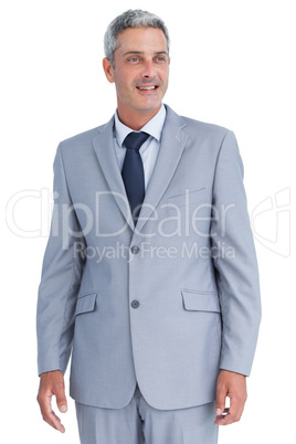 Happy businessman looking away