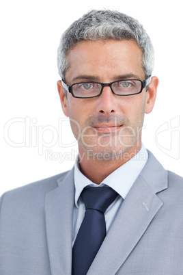 Confident businessman wearing glasses