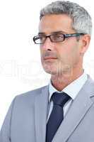 Thoughtful businessman wearing glasses