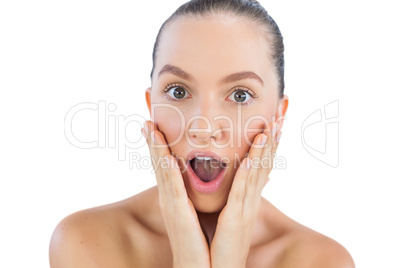 Young woman looking surprised