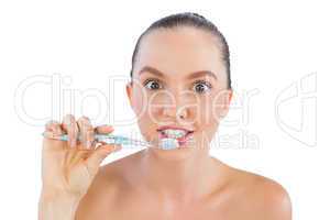 Funny woman with toothbrush
