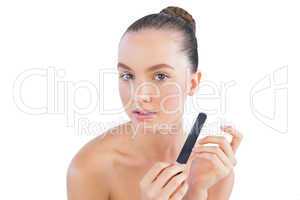Pretty model with nail file