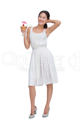 Cheerful brunette posing with cocktail