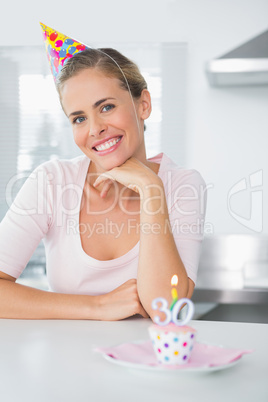 Smiling woman on her 30th birthday