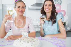 Cheerful women having a birthday toast