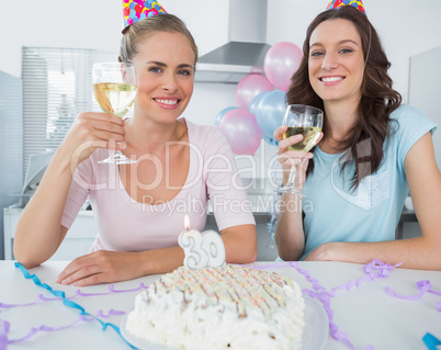 Smiling women having a birthday toast
