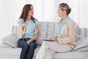 Woman talking to her psychologist