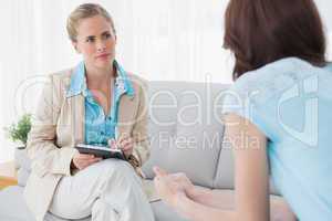 Psychologist having session with her patient