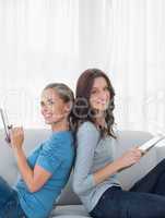 Cheerful women with tablet computer