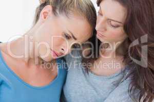 Woman consoling her friend