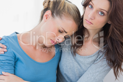 Woman consoling her upset friend