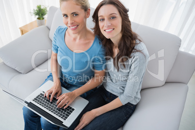 Women posing while surfing the web