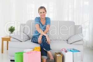 Blonde woman with shopping bags