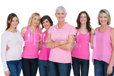 Enthusiastic women posing with pink tops for breast cancer