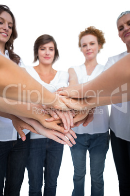 Relaxed models joining hands in a circle