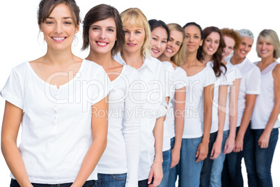 Cheerful models posing in a line