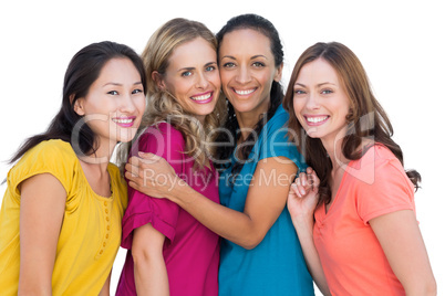 Cheerful models posing hugging each other