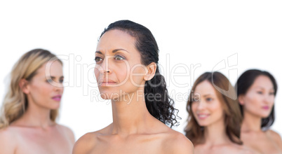 Peaceful nude models posing looking away