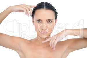 Attractive topless model gesturing