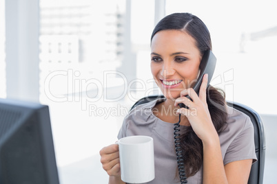 Smiling secretary answering phone