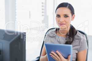 Content attractive secretary using tablet pc